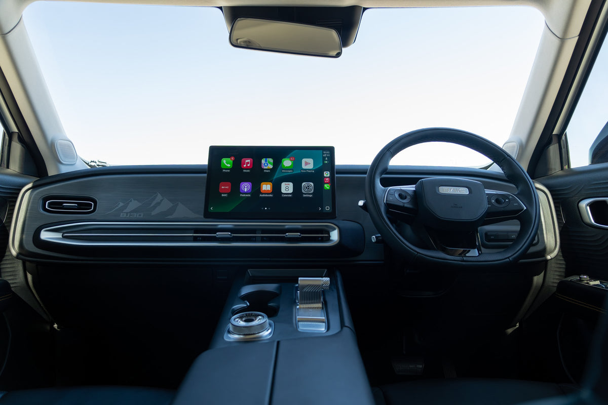 BAIC B30 right-hand-drive cabin, showing the central touchscreen, driver display and centre console